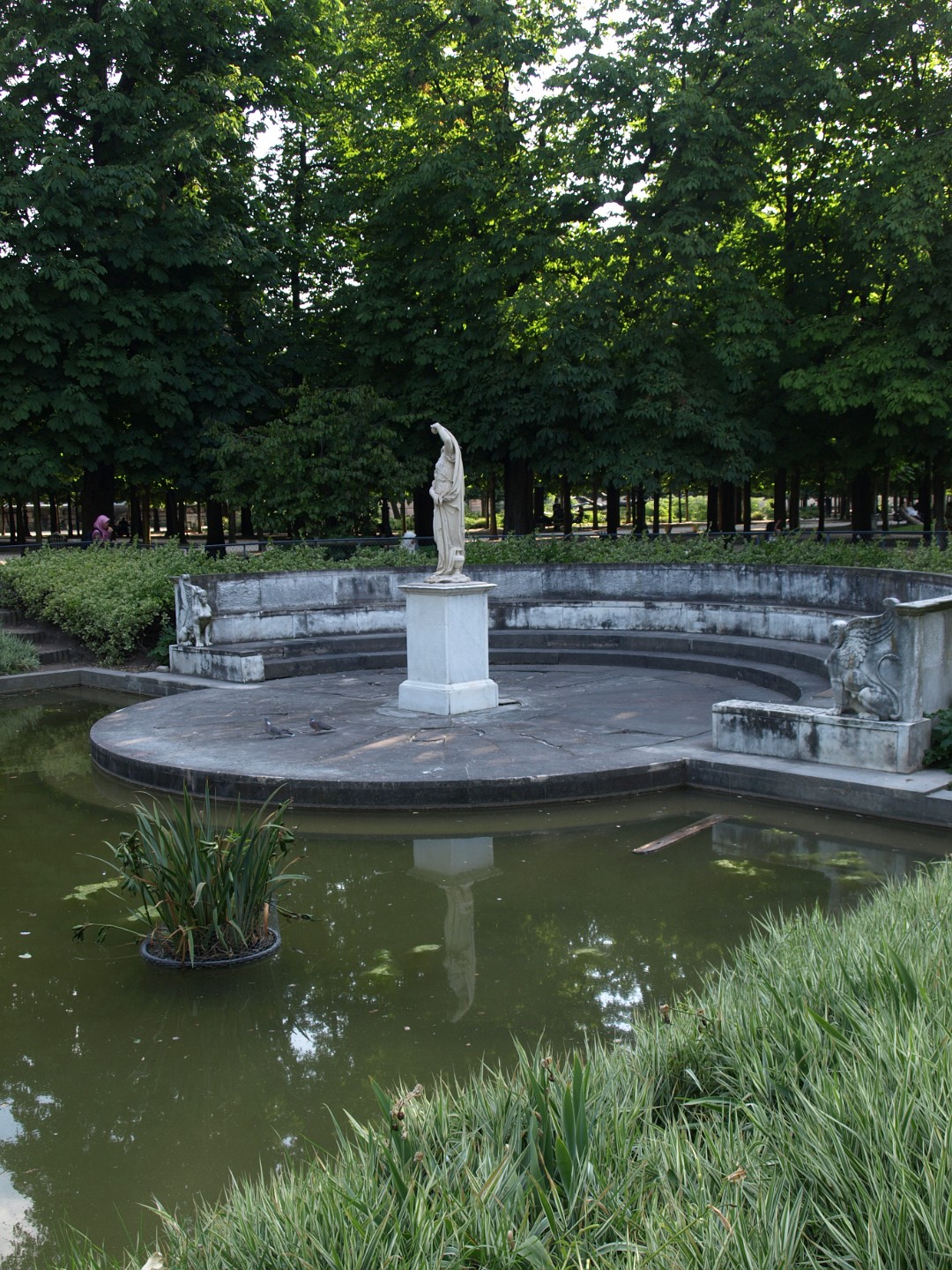 Statue Surrounded by Sphinxes